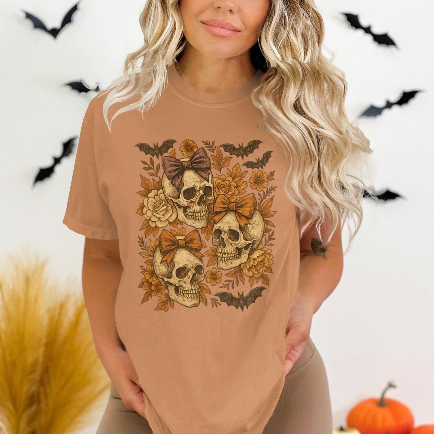Vintage Halloween Skull and Bow Graphic Tee product