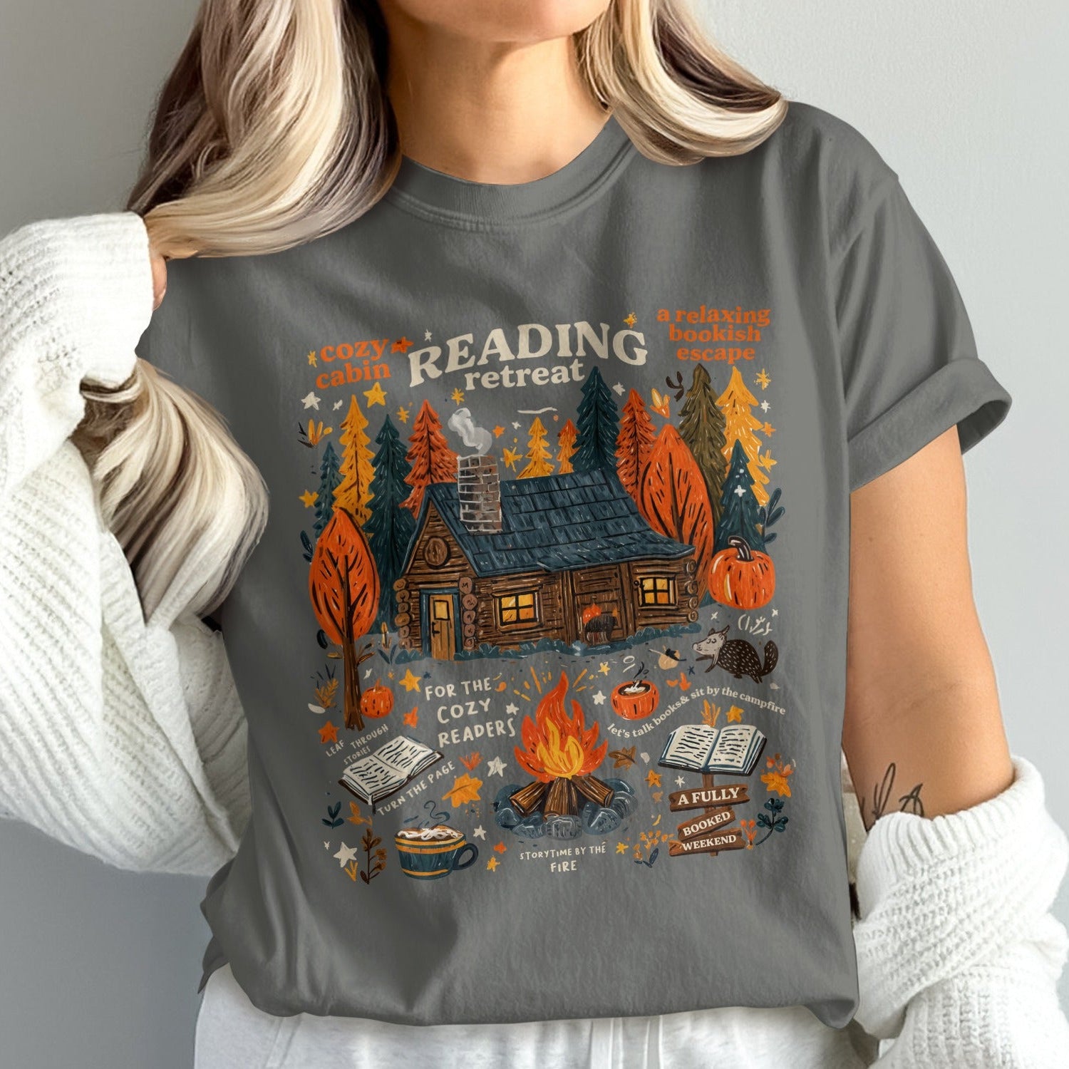 Cozy Reading Retreat Cabin Escape Graphic Tee product type